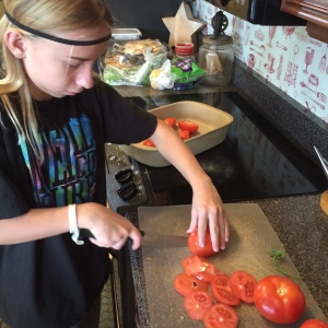 Connor prepping his tomatoes for roasting 