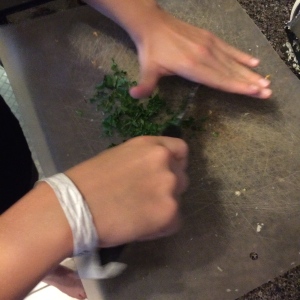 Connor Chopping up his herbs like a pro!